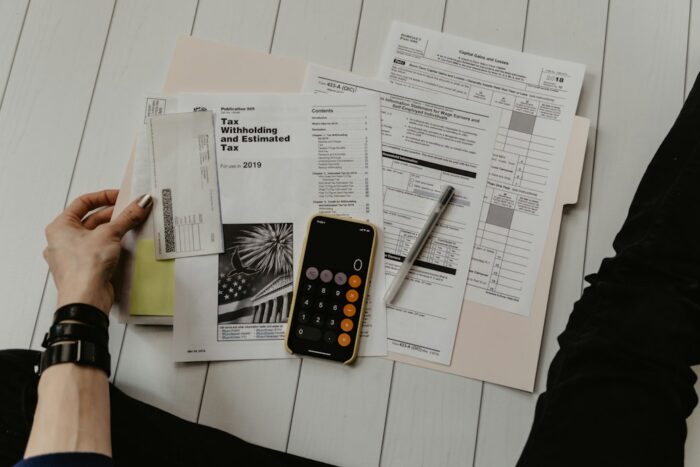 Calculator and paperwork