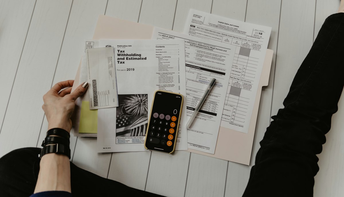 Calculator and paperwork