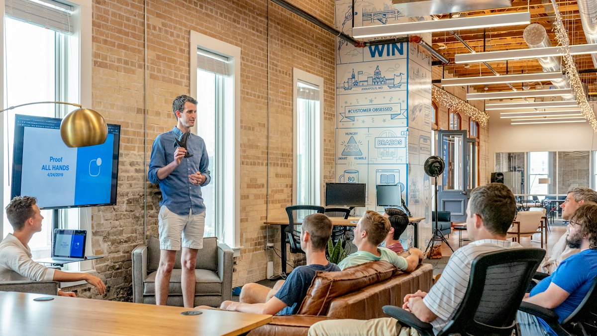Colleagues talking in an office